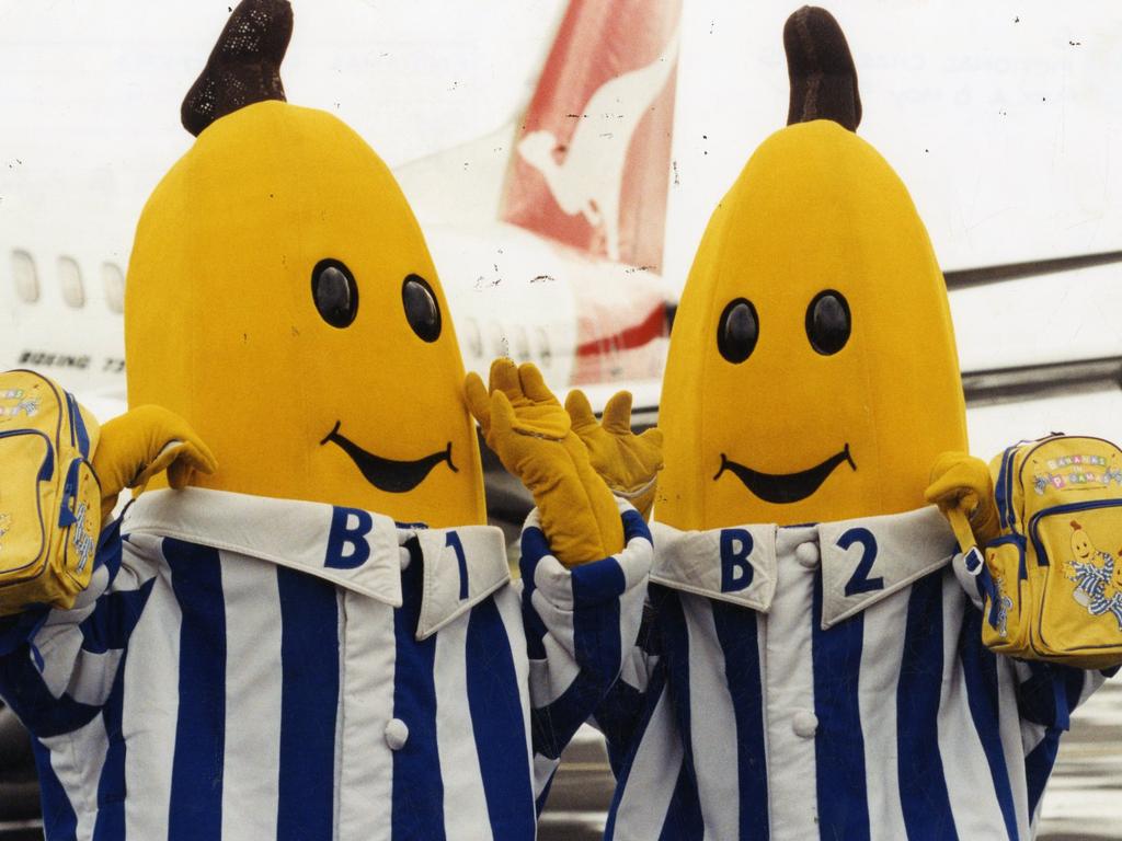 Fictional characters B1 and B2 from ABC children's TV program "Bananas in Pyjamas" arriving at Adelaide Airport aboard a Qantas aeroplane. Used "The Advertiser" 08 May 1996.