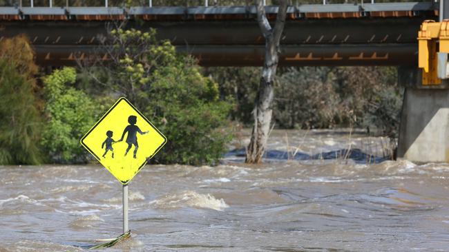 Rapids at the old Breakwater Bridge after the flooding in Geelong. Picture: Alan Barber