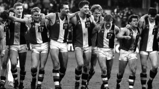 Frawley and his St Kilda teammates sing the club song after a win.