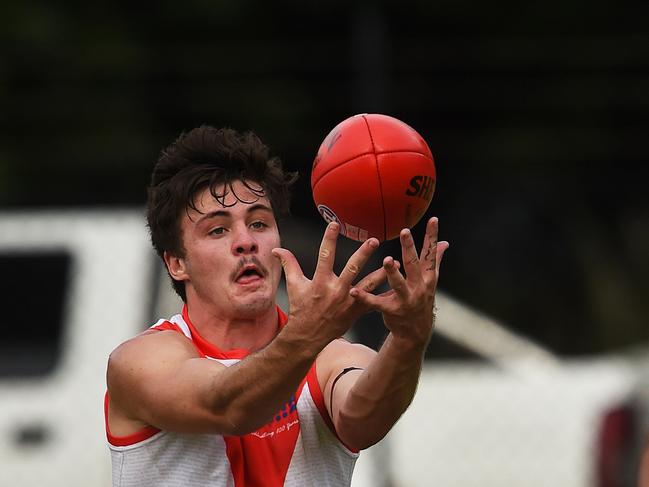 Waratah's Sam Godden picks off a pass for the mark  against the Wanderers during Thursday's annual Australia Day match at the Garden's Oval.