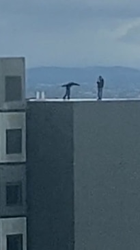 Skateboarders filmed riding on top of 40 story building in Melbourne