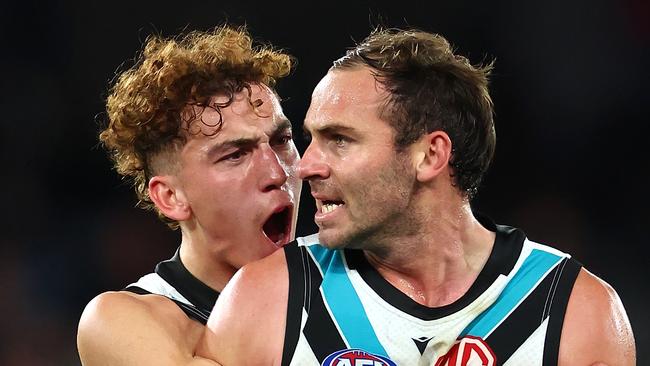 MELBOURNE, AUSTRALIA - JUNE 30: Jeremy Finlayson of the Power is congratulated by Logan Evans after kicking a goal during the round 16 AFL match between St Kilda Saints and Port Adelaide Power at Marvel Stadium, on June 30, 2024, in Melbourne, Australia. (Photo by Quinn Rooney/Getty Images)