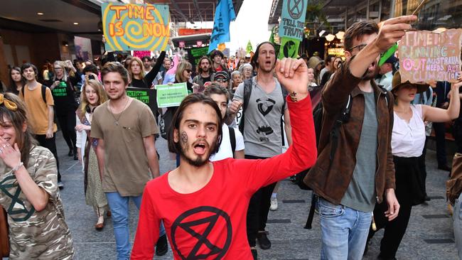 Environmental activist Eric Herbert with Extinction Rebellion protestors in the Queen Street Mall on August 6. Picture: Darren England/AAP