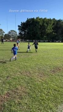 Six-year-old destroys opposition in junior footy match