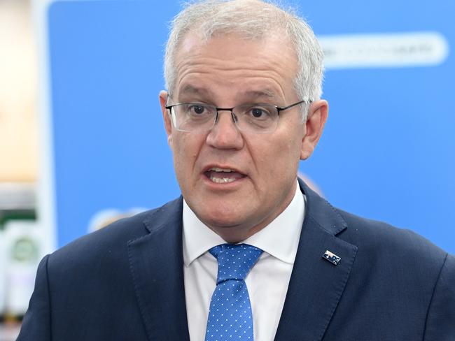 SYDNEY, AUSTRALIA - NewsWire Photos DECEMBER 10, 2021:, Prime Minister Scott Morrison visits Destro's Pharmacy in Drummoyne to announce the rollout for the covid-19 vaccination of children aged five to eleven beginning on January 10., Picture: NCA NewsWire / Jeremy Piper