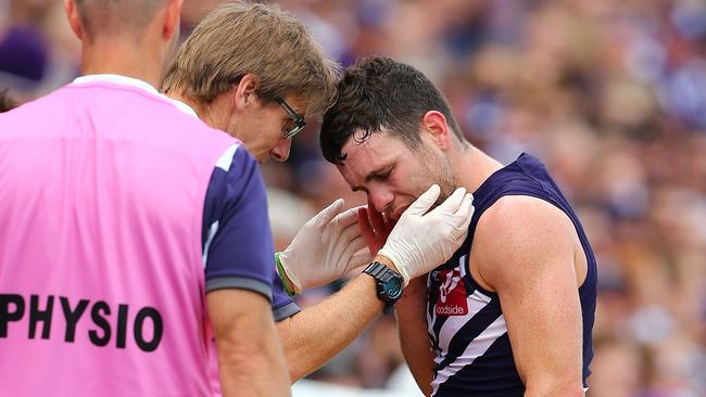 Hayden Ballantyne gets checked by club doctors.