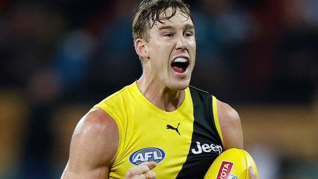 Harry Taylor will have his work cut out trying to stop combative Richmond forward Tom Lynch. Picture: AFL Photos/Getty Images