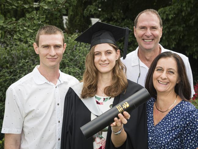 Bachelor of Business graduate Yvette Bezuidenhout with family (from left) Rykent, Fred and Rialette Bezuidenhout at a UniSQ graduation ceremony at Empire Theatres, Tuesday, February 13, 2024. Picture: Kevin Farmer