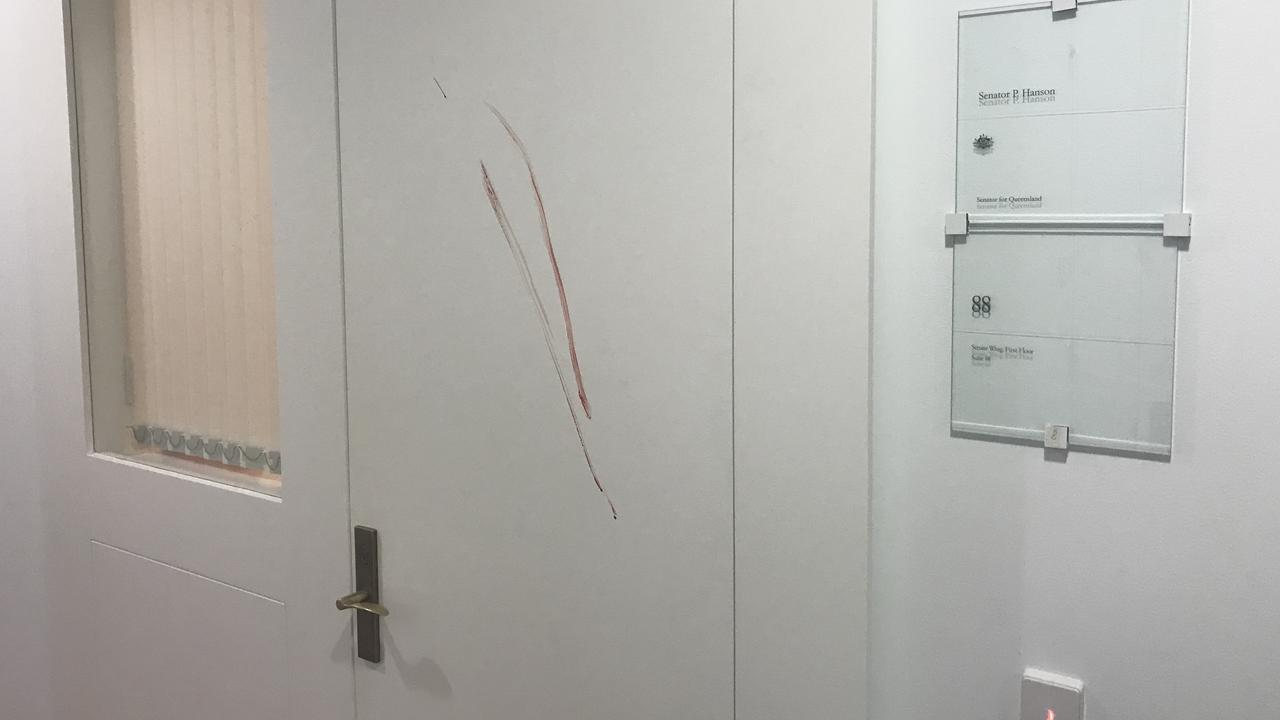 The blood smeared on the door of Pauline Hanson's office. 