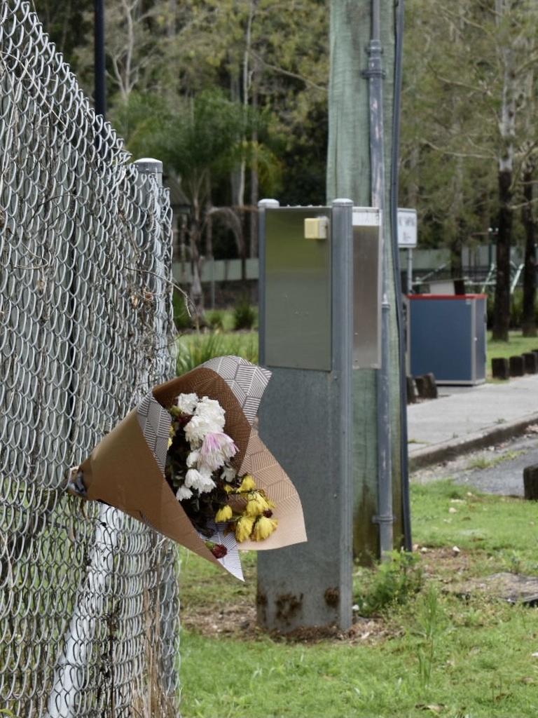 Friends of Jackson Stacker left flowers at the Sleepy Hollow's rest area on the Pacific Highway, after his body was found nearby. Photo: Javier Encalada