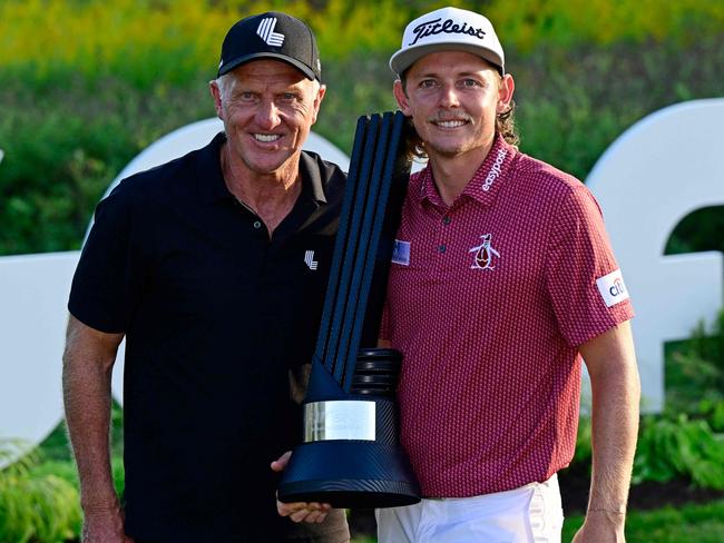 (FILES) In this file photo taken on September 18, 2022 team Captain Cameron Smith of Punch GC poses with Greg Norman, CEO and commissioner of LIV Golf, after winning the individual title during Day Three of the LIV Golf Invitational - Chicago at Rich Harvest Farms in Sugar Grove, Illinois. - LIV Golf is close to sealing a deal with broadcaster Fox Sports which will see the Saudi-funded circuit pay for coverage on television, a US media report said September 28, 2022. (Photo by Quinn Harris / GETTY IMAGES NORTH AMERICA / AFP)