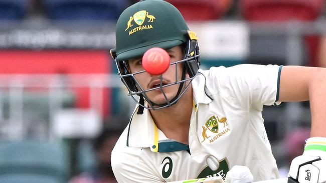 TOPSHOT - Australian Prime minister XIâs Sam Konstas plays a shot during the tour cricket match between the Prime Minister's XI and India at Manuka Oval in Canberra on December 1, 2024. (Photo by SAEED KHAN / AFP) / -- IMAGE RESTRICTED TO EDITORIAL USE - STRICTLY NO COMMERCIAL USE --