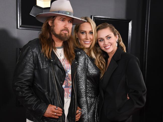 Miley’s parents, Billy Ray and Tish, appear to have suffered a nasty split. Picture: Valerie Macon/AFP