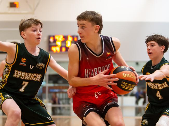 Warragul Warriors in action against Ipswich Force on day one at the Basketball Australia U14 Club Championships. Picture: Darrell Nash