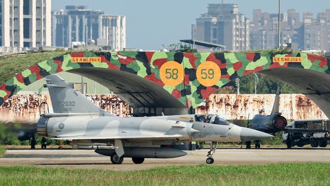 A Taiwanese air force Mirage 2000 fighter jet is seen on the tarmac of an air force base in Hsinchu on October 14, 2024. China deployed planes and ships to encircle Taiwan on October 14, in drills Beijing said were aimed at sending a ‘stern warning’ to ‘separatist’ forces on the self-ruled island. Picture: I-Hwa Cheng/AFP