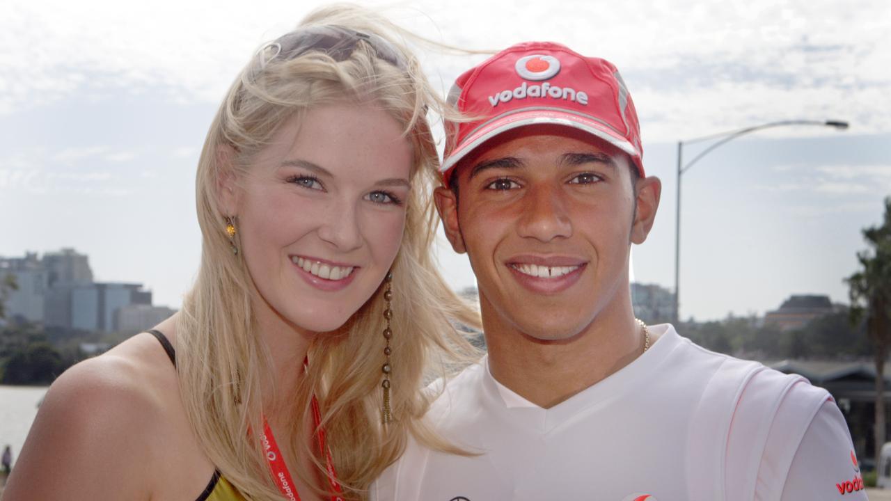 Young Lewis Hamilton meets Miss World Caroline Pemberton at the 2008 Australian Grand Prix.