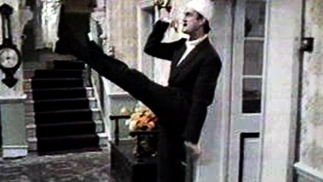 Undated photo. John Cleese as Basil Fawlty doing an impression of Adolf Hitler in the television progam &amp;Fawlty Towers&amp;.