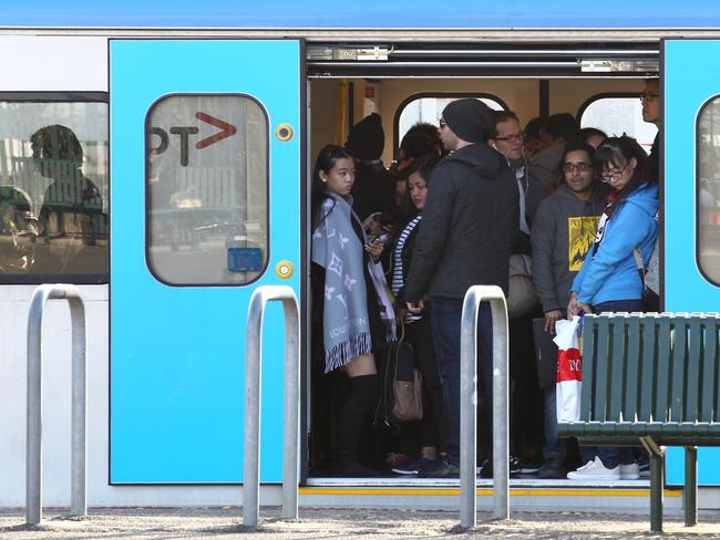 Passangers catch the last few trains at Caulfield train station as Metro trains in Melbourne stop running from 10am to 2pm due to strike action. Friday Sept  4. 2015. Picture: David Crosling