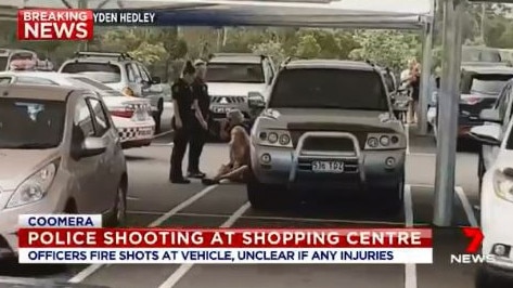 Crime on the northern Gold Coast — a crime scene is created after police shot at a car believed to be stolen car at an Upper Coomera shopping centre. Photo: Channel 7 News. 