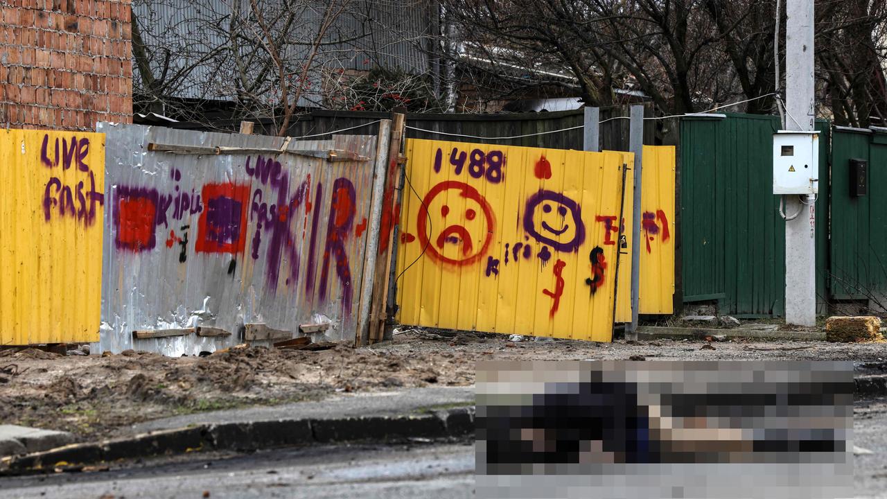 A dead body lies on a street in Bucha. Picture: Ronaldo Schemidt/AFP