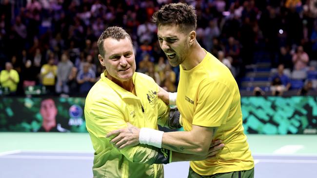 Thanasi Kokkinakis celebrates with Lleyton Hewitt. Photo by Matt McNulty/Getty Images for ITF.