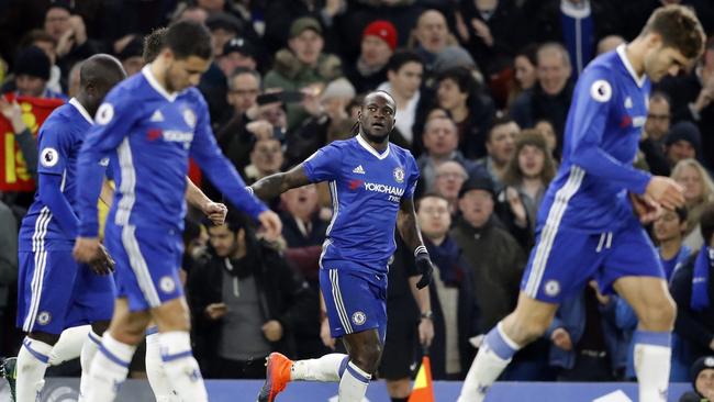 Chelsea's Victor Moses (C) celebrates after scoring.