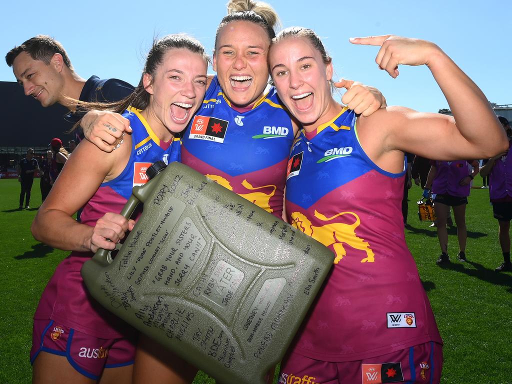 Lions players celebrate winning last season’s AFLW decider. Picture: Quinn Rooney/Getty Images