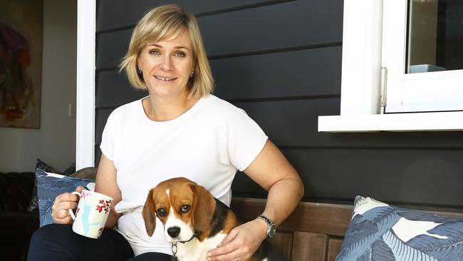 New member for Warringah Zali Stegall on her back verandah with dog "Charli". Picture: John Appleyard