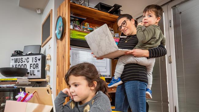 Diana Jeffery juggles a full time job, home schooling her daughter Olivia and looking after her son Angus after daycare centres were closed due to lockdown. Picture: Jake Nowakowski