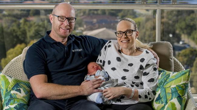 The happy couple with their bub. Picture: Jerad Williams