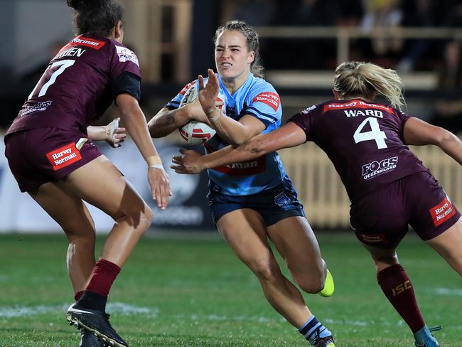 Kelly runs straight at the line during Origin. Pic: Adam Head