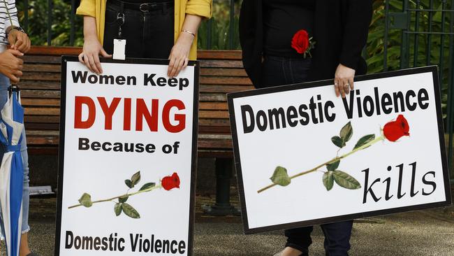 Members of the public gathered at a red rose rally that was held in Brisbane for domestic violence victims Kelly Wilkinson and Lordy Ramadan. Picture: NCA NewsWire/Tertius Pickard