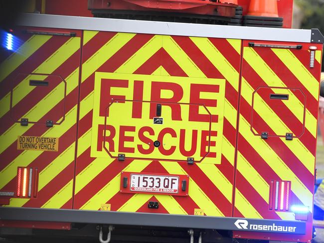 Fireys attend a house fire in Toowoomba, fire and rescue sign generic, QFES, Friday, June 23, 2023. Picture: Kevin Farmer