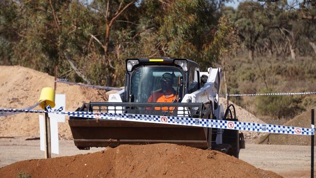 Searching continues along Arumpo Rd at Mourquong on Monday. Picture: Michael DiFabrizio