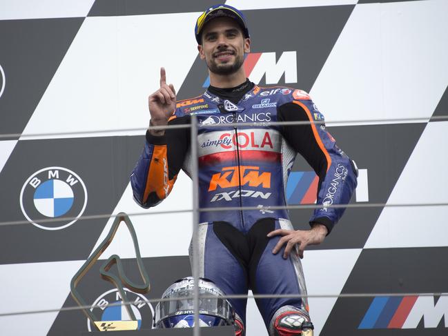 Miguel Oliveira celebrates on the podium his first MotoGP victory. (Photo by Mirco Lazzari gp/Getty Images)