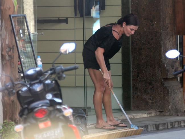 Schapelle Corby cleans up at The Boardroom surf shop before realising the job was too much in the public eye.