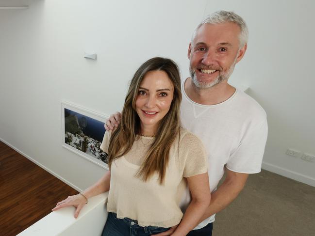 Simon and Rose Palmer in their Woolstore apartment, Teneriffe. Picture: Liam Kidston