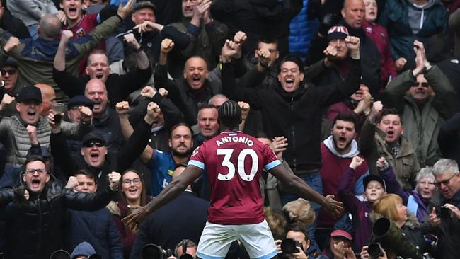 West Ham United midfielder Michail Antonio celebrates in front of fans after scoring against Tottenham. Picture: AFP
