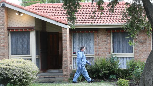 Police and forensics at the scene in Bayswater North where a woman was allegedly killed. Picture: David Crosling