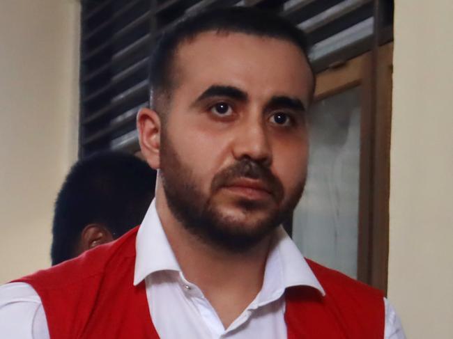 NETWORK SPECIAL. NO AUS, NO NEWS.COM , PLEASE CONTACT NETWORK PICTURE DESK BEFORE PUBLISHING.     ,    Australian Mohamed Rifai, 27 escorted by Prosecutor for his verdict at Denpasar District Court Tuesday May 35 2025. Mohamed demanded 5 month in jail over the alleged assaulting outside Finns Beach Club in North Kuta on last February. (Photo. Lukman S. Bintoro)