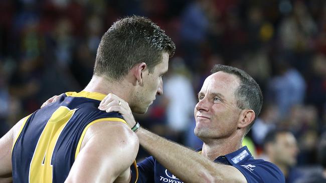 Adelaide coach Don Pyke talks with Josh Jenkins. Picture SARAH REED