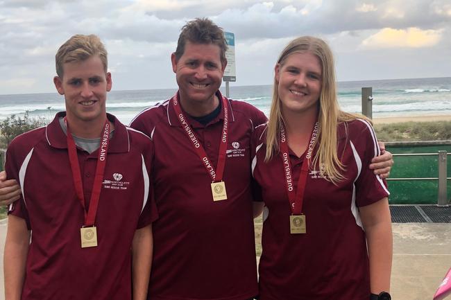 (From left) Jack Moore, father Andrew Moore, and daughter Georgia Moore. All three won their respective categories at the Queensland Surf Rescue Championships. Picture: Supplied.