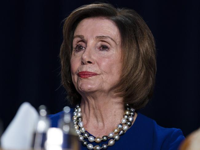 Speaker of the House Nancy Pelosi of Calif., listens as President Donald Trump speaks at the 68th annual National Prayer Breakfast. Picture: AP