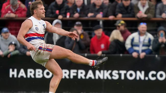 Josh Newman kicks a goal in last season’s MPFNL Division 2 grand final. Picture: Valeriu Campan