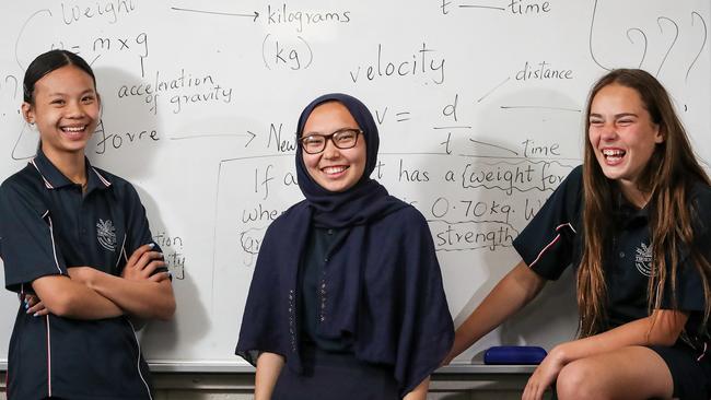 Einsteinian physics students Nguyen Nguyen, 12, Sabira Faiyazi, 13, and Mia Sutton, 13, at Thornlie Senior High School in Perth. Picture: Colin Murty