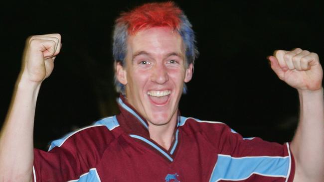 A colourful Trevor Morrison celebrates his team's 3-0 victory over Caloundra. Photo: Brett Wortman