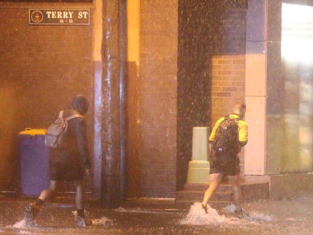 The low hits Sydney at Sunrise . Streets in surry hills are flooding .picture John Grainger