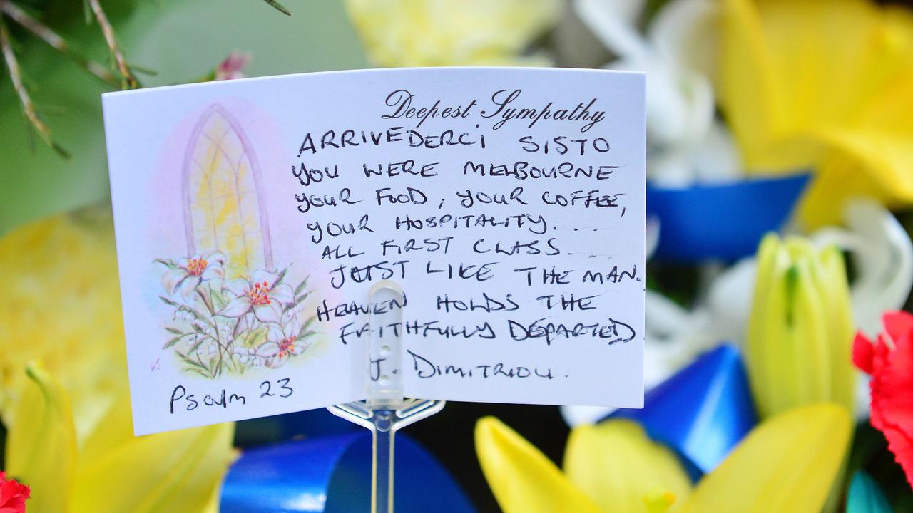 A card and floral tributes for Sisto Malaspina. Picture: Nicki Connolly
