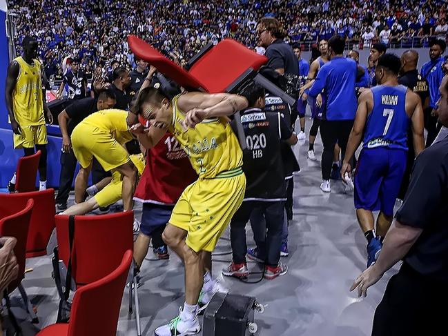 In this photo taken July 2, 2018, a general shot of the brawl between Philippine and Australian players during their FIBA World Cup Asian qualifier game at the Philippine arena in Bocaue town, Bulacan province, north of Manila.  / AFP PHOTO / PET SALVADOR