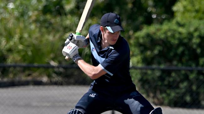 Kew opener Andrew Chalkley swings the bat. Picture: Andy Brownbill